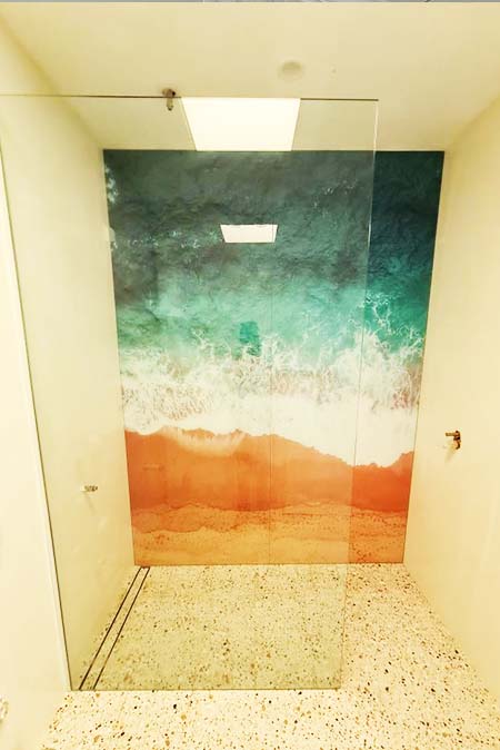 digital print beach feature wall in shower